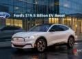 Ford electric vehicle outside corporate headquarters symbolising Ford’s $19.5 billion EV restructuring and strategic reset in 2025