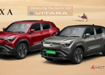 Maruti E Vitara electric SUV in red and silver showcasing front and side design