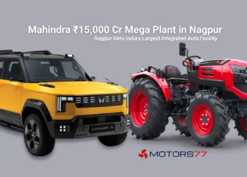 Mahindra ₹15,000 crore mega plant in Nagpur announcement banner showing SUV and tractor