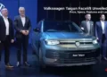 Volkswagen Taigun Facelift unveiled in India showing the new SUV with LED light bar at launch event